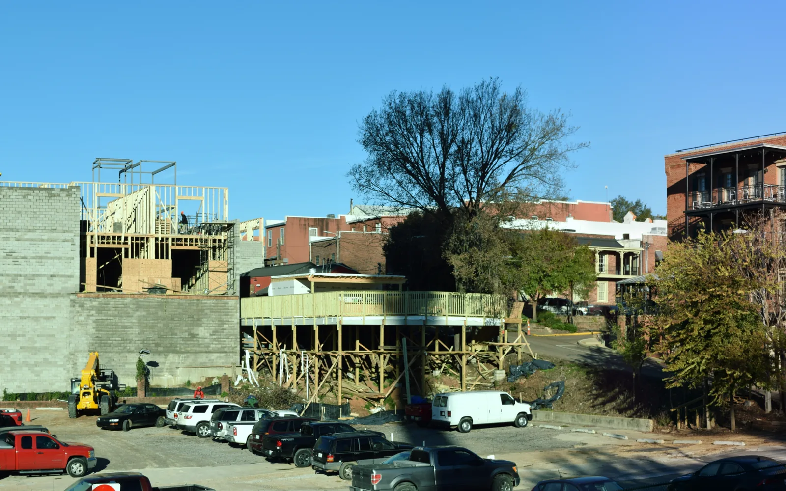 A new building goes up behind the Square in downtown Oxford.