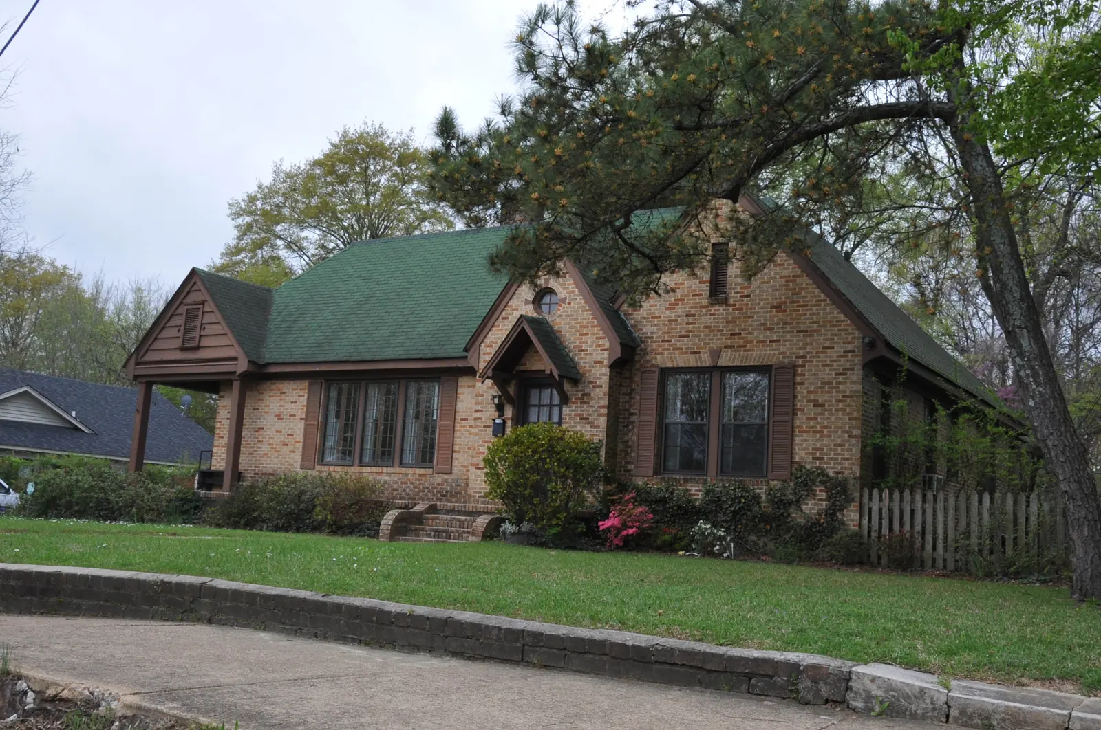 A two-story brick house in the South Lamar Historic District of Oxford, built in 1931 for William Faulkner's parents.