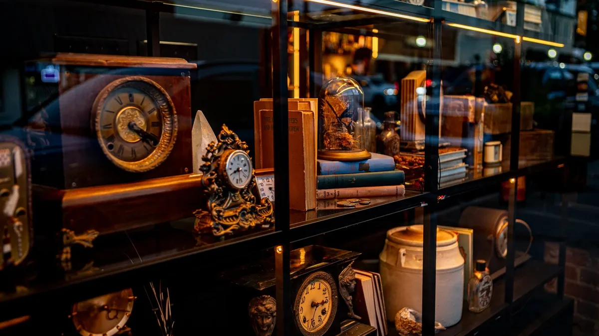 The clock shop window at Miscellanea Spirit House on South Lamar Boulevard, the front room guests walk through to reach the bars.