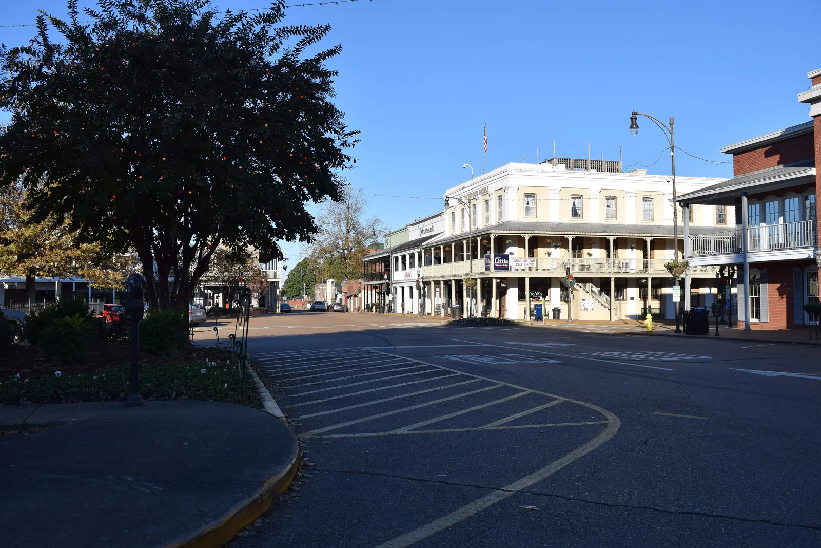 Shops and a two-story balcony on the north side of the Square in downtown Oxford.