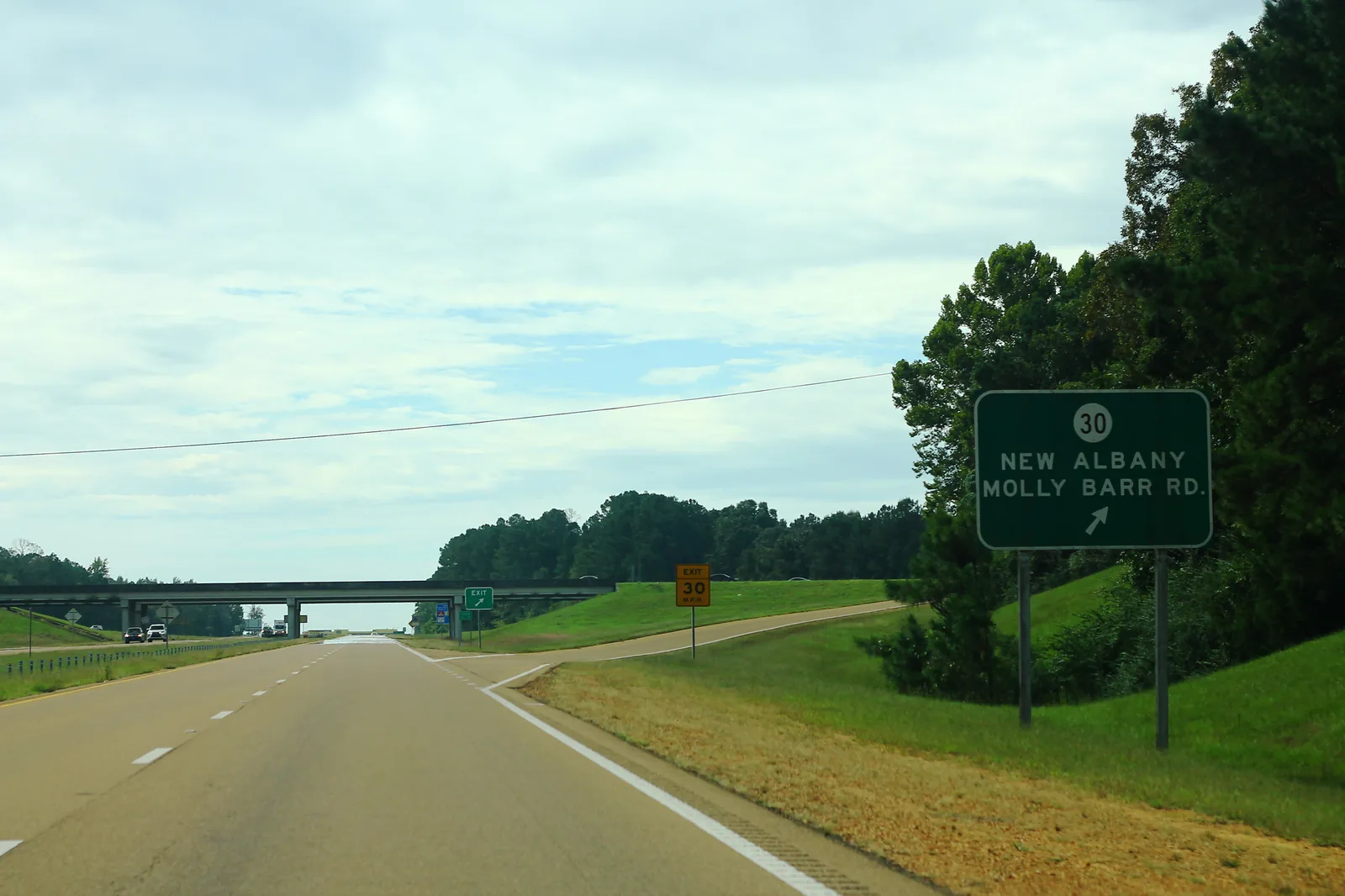 A sign on Highway 7 southbound marks the Highway 30 exit for New Albany and Molly Barr Road in Oxford.